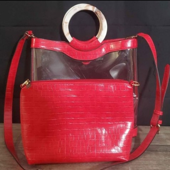 Clear bag with red trim, perfect for stadium use. - Picture 2 of 6